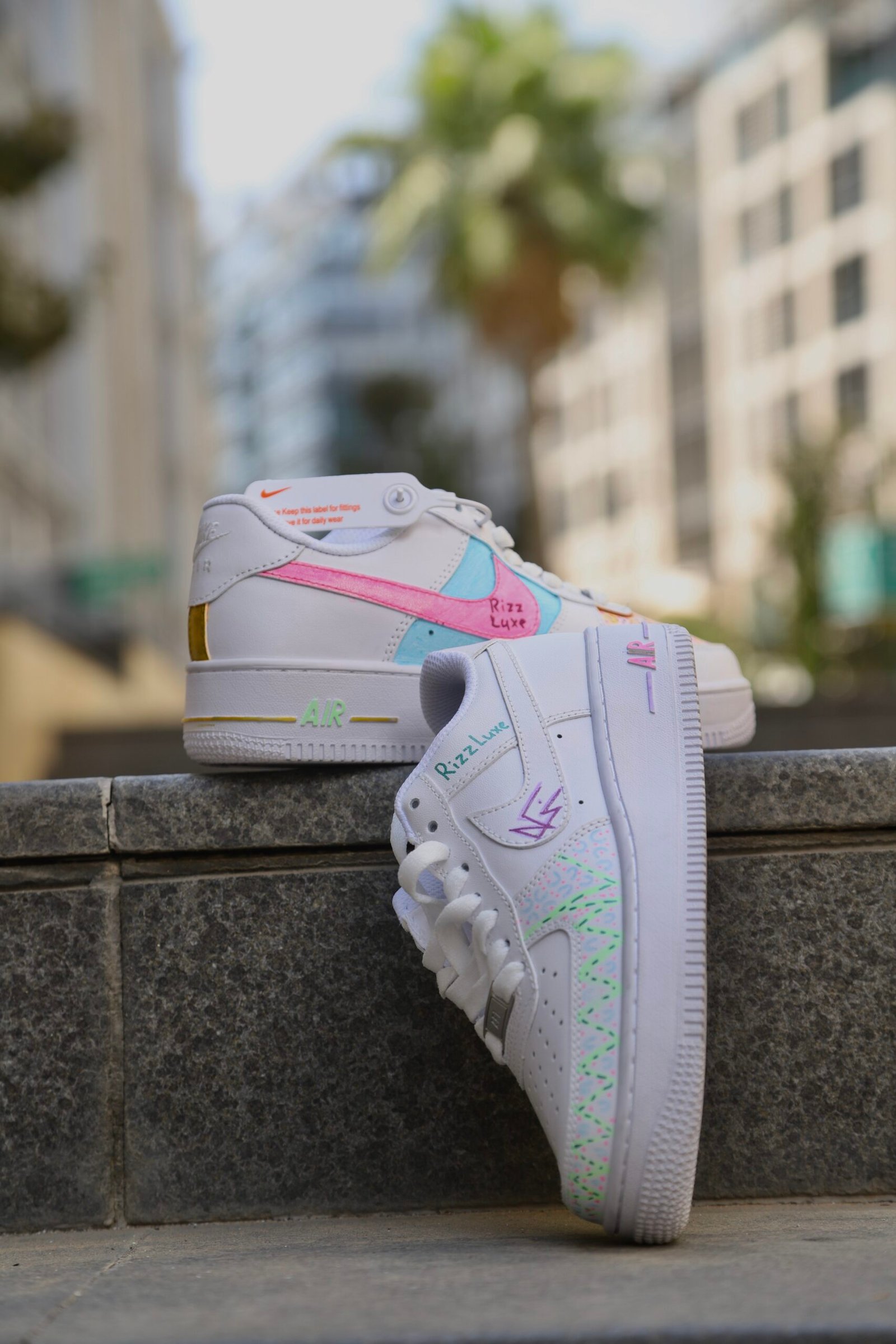 Custom RizzLuxe sneaker design with girl's hand